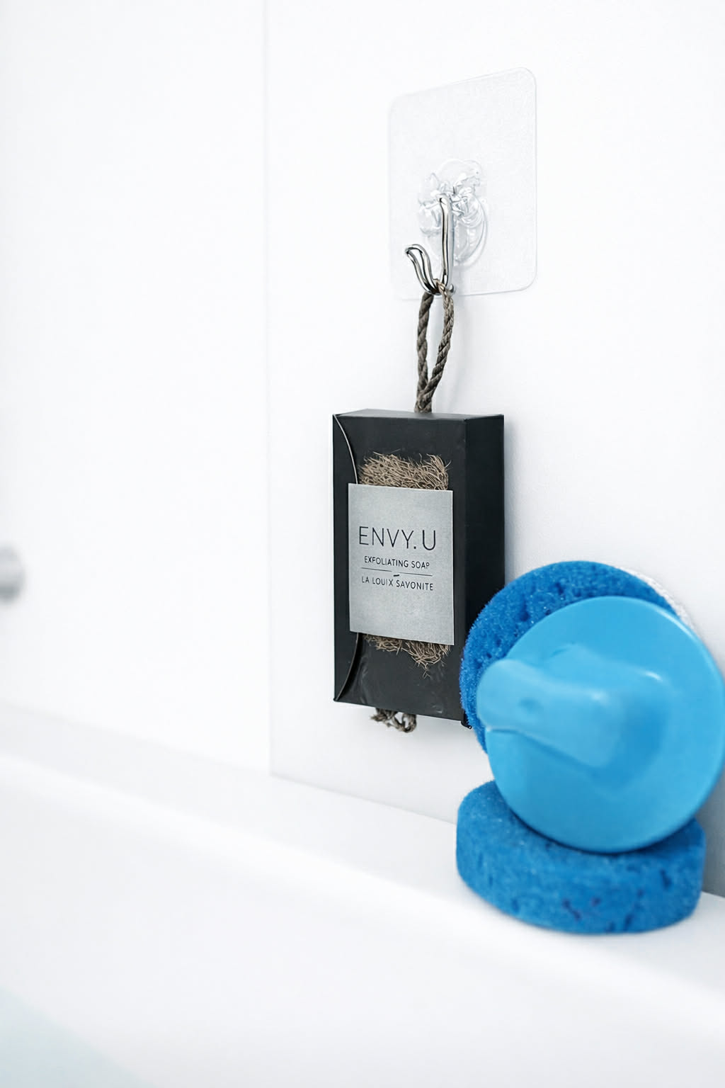 Sponge applicator, cleanser hanger