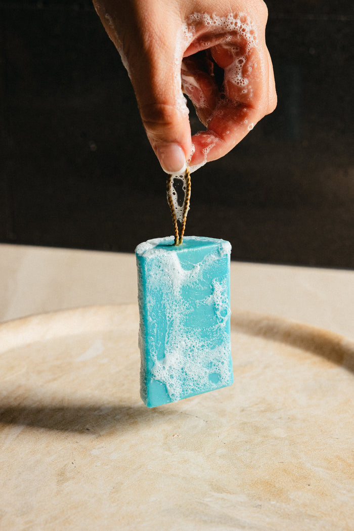 Clear Envy Acne Cleanser hanging by its rope
